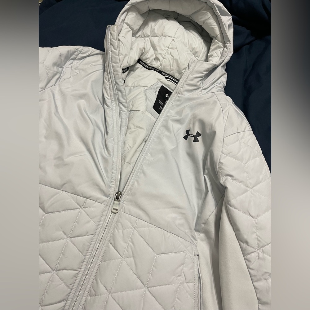 Under armour puffer jacket. Very light blue almost white